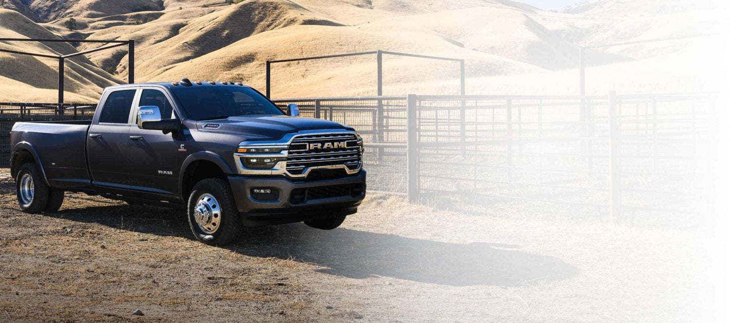 Gray 2026 Ram 3500 Limited Longhorn 4x4 crew cab heavy duty pickup parked